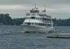 white boat on body of water at daytime